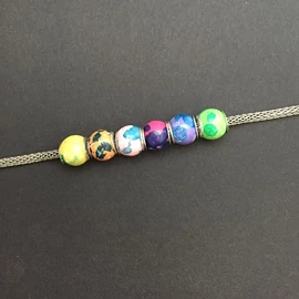 Kék batikolt charm vegyes színben  Kék batikolt charm vegyes színben